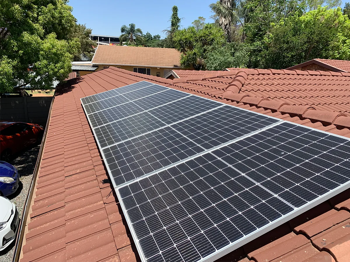 solar-panel-on-red-house-roof